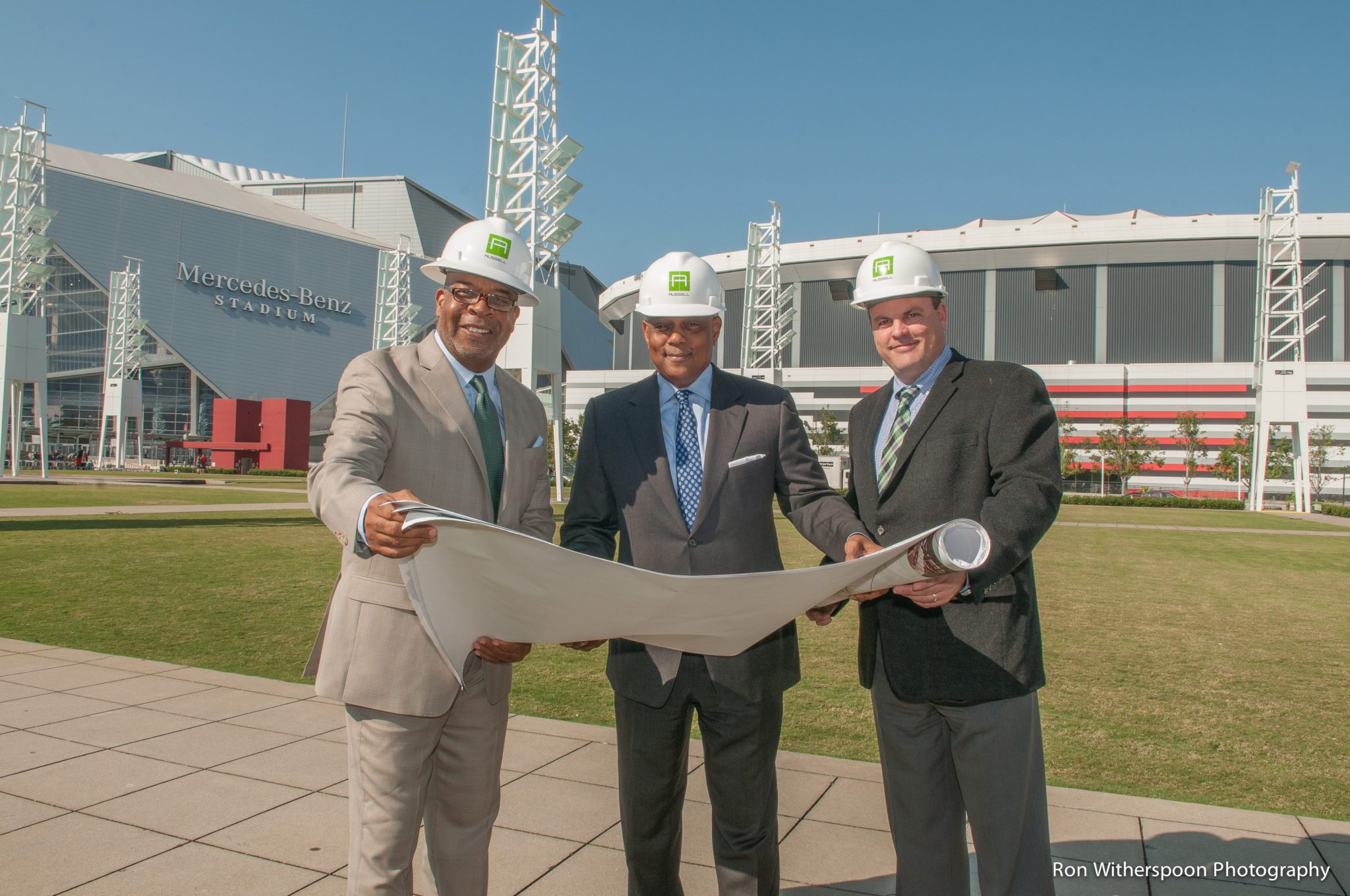 (l-r) HB Brantley, Project Executive Consultant, Michael Russell, CEO, and Bryan Jackson, Vice President of Program Management, plot their next big move with Russell's S.P.A.C.E. division. Photo credit: Ron Witherspoon.